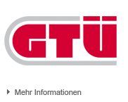 GT�